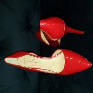 Red patent leather pumps